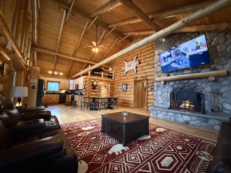 Luxury cabin for guided trophy hunts and vacation rentals living room and kitchen